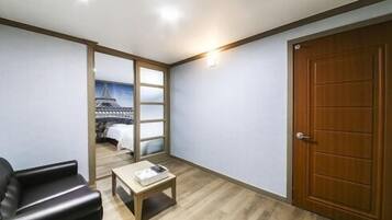Triple Room | Living room | 40-inch TV with digital channels, heated floors