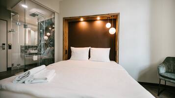 Pillowtop beds, blackout drapes, soundproofing, WiFi (free)