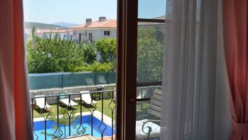 Room, Pool View | View from room