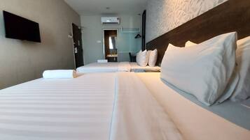 Family Triple Room, Multiple Beds, City View | Premium bedding, down duvets, desk, iron/ironing board (on request)