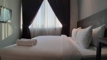 Premium bedding, down duvets, desk, iron/ironing board