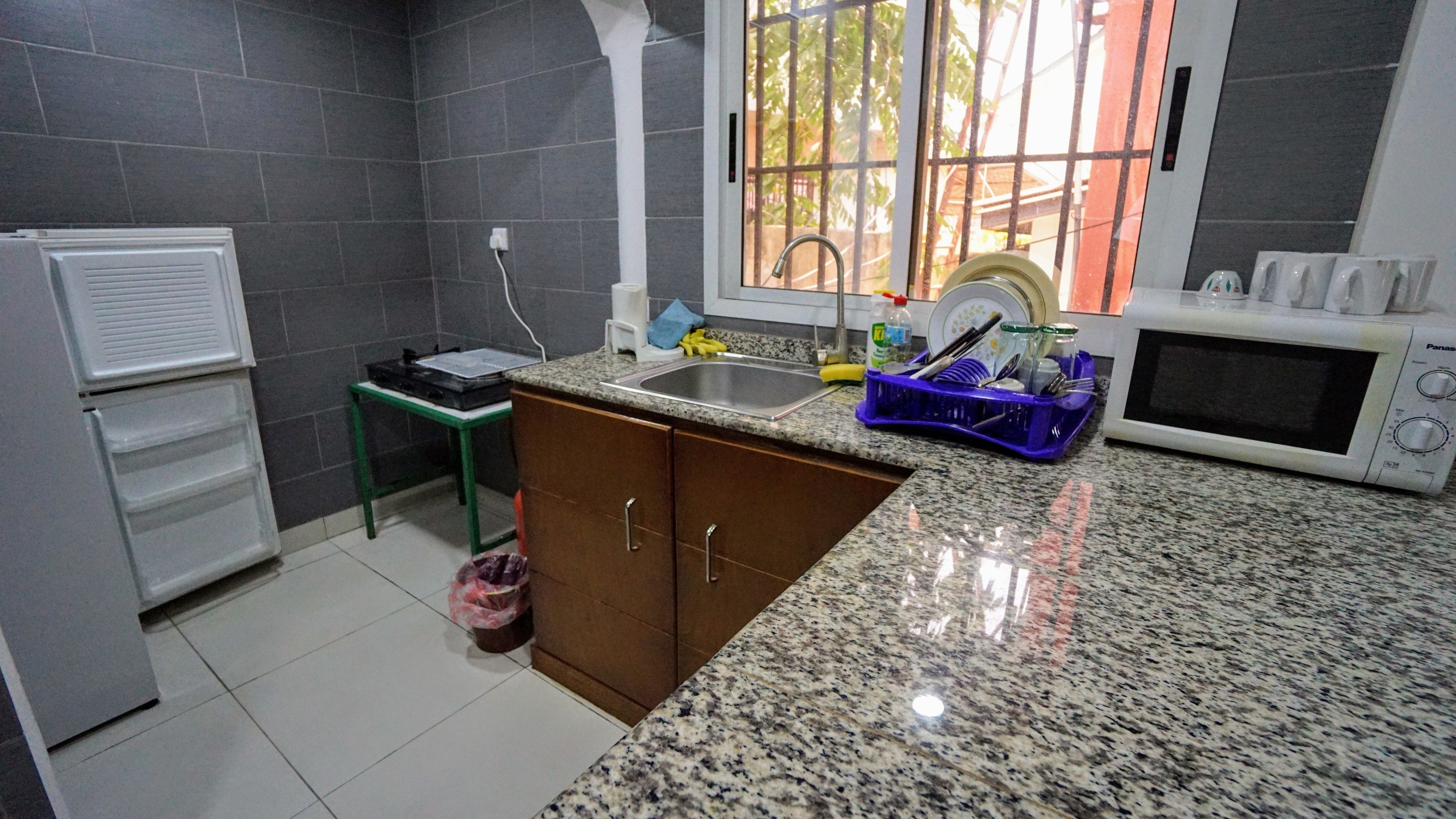 apartment, pool view | private kitchenette | fridge, microwave, coffee/tea maker, electric kettle