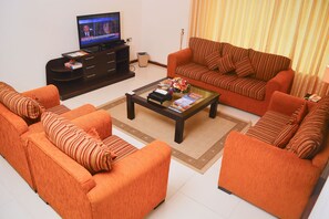 Deluxe Duplex, 4 Bedrooms, City View | Living area