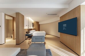 Suite, 1 King Bed, City View | Minibar, in-room safe, desk, blackout drapes