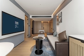 Suite Signature, 1 chambre | Coin séjour | Télévision LCD