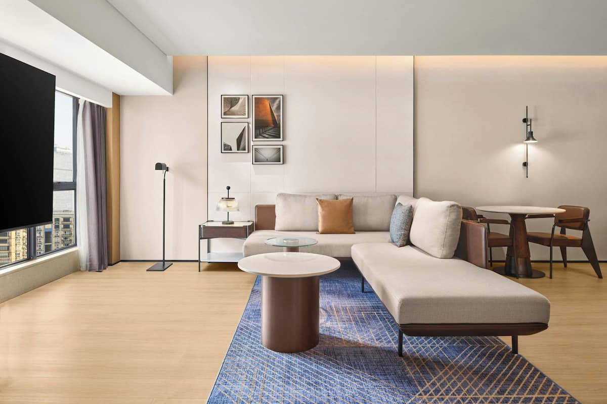 Suite, 1 King Bed, City View | Down comforters, minibar, in-room safe, desk