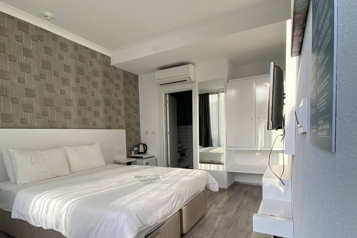 Double Room, Garden Area | Iron/ironing board, free WiFi