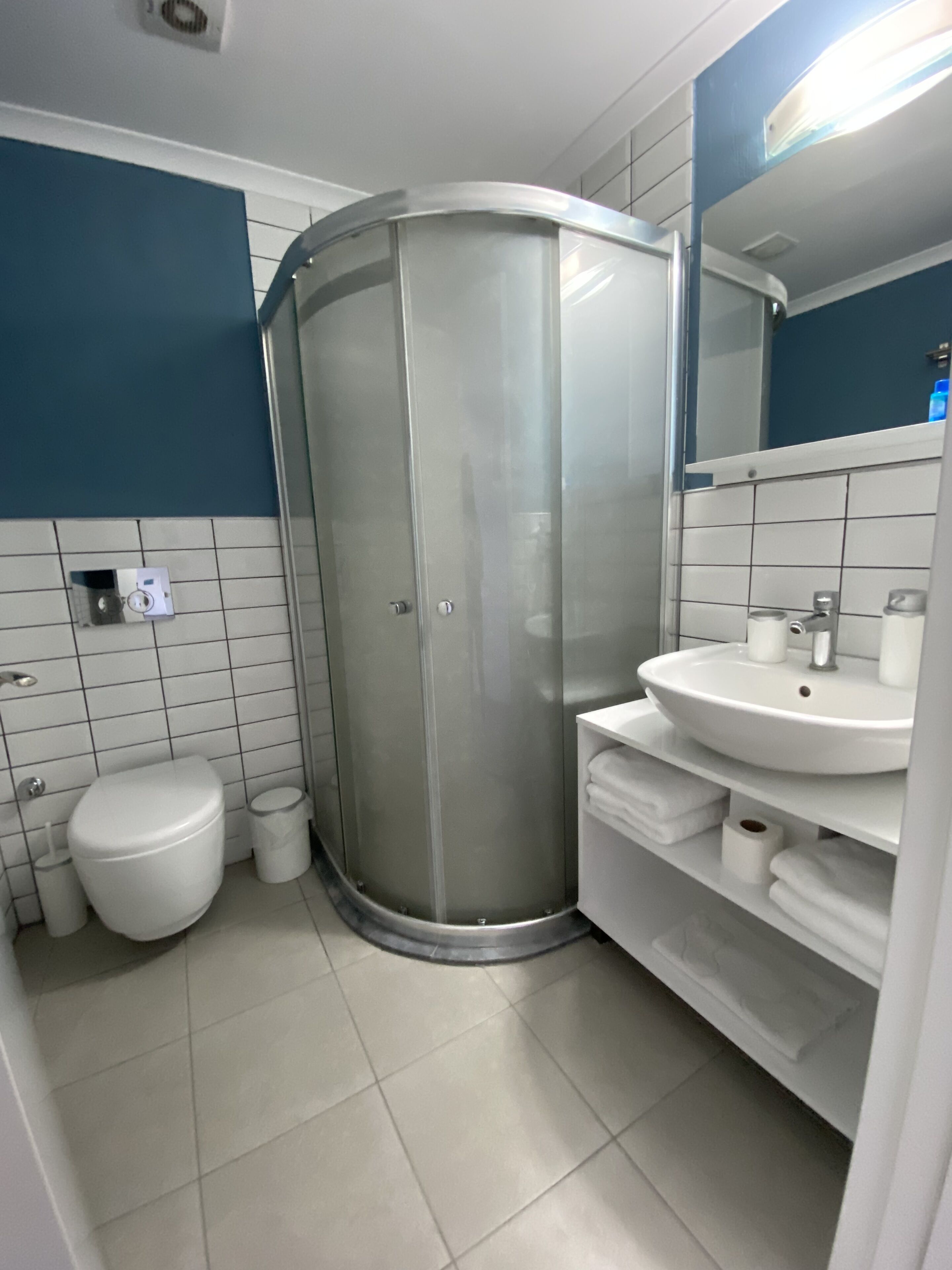 double room, sea facing | bathroom | shower, hair dryer, slippers, towels