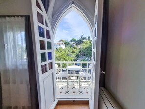 Deluxe Room, Partial Sea View | Minibar, iron/ironing board, free WiFi, bed sheets