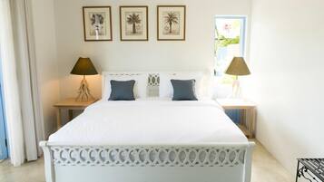 Chambre Deluxe | Minibar, coffres-forts dans les chambres, rideaux occultants