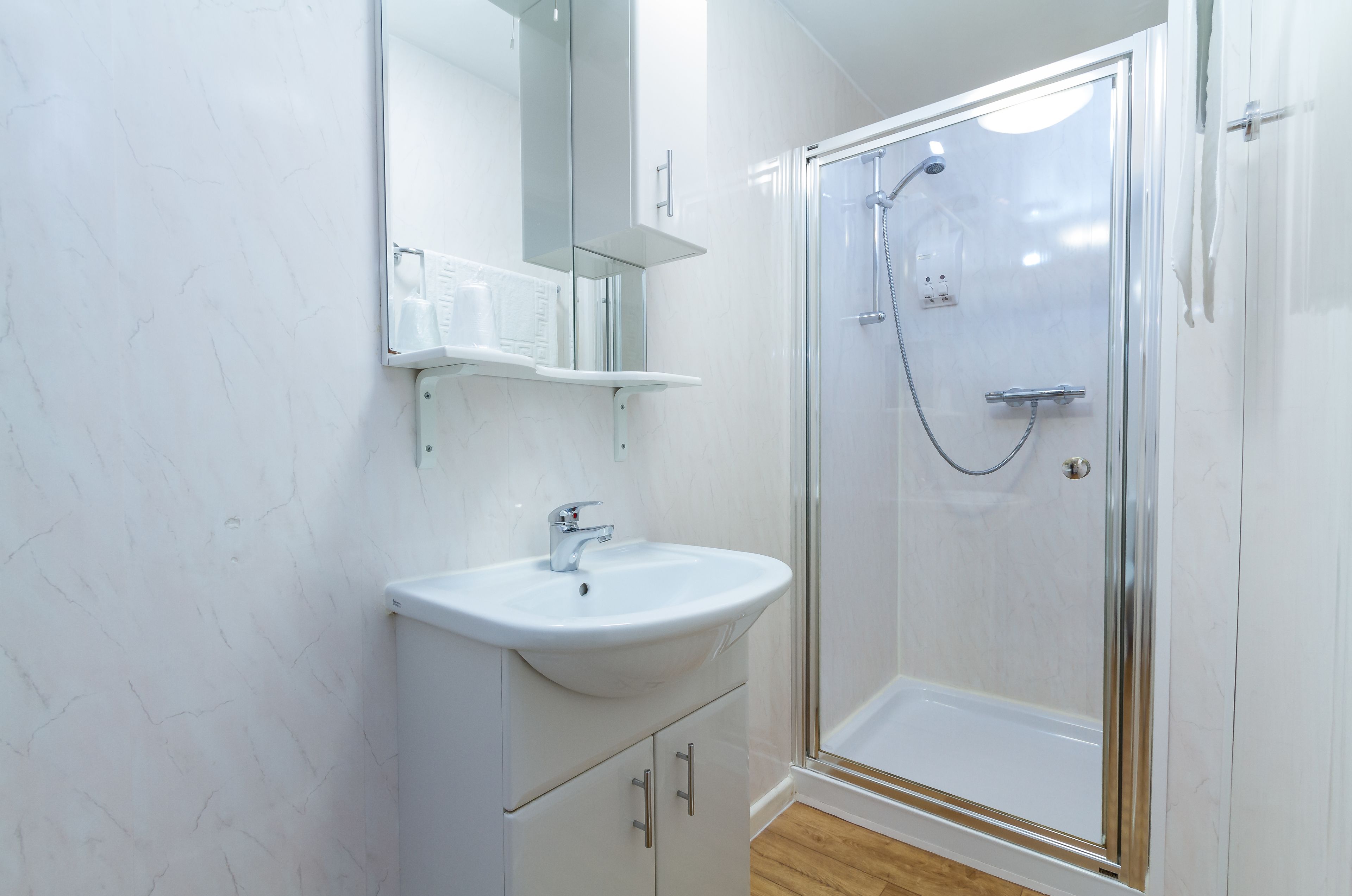 superior twin room | bathroom | hair dryer, towels