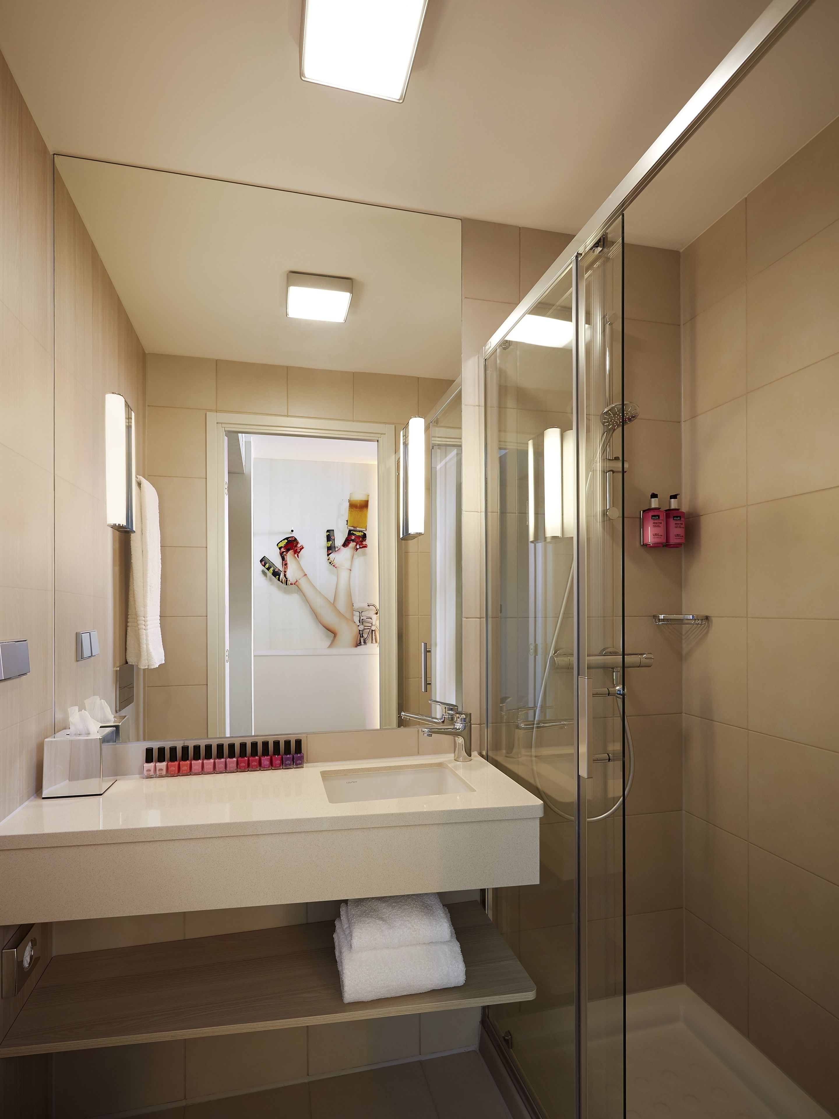 shower, free toiletries, hair dryer, towels