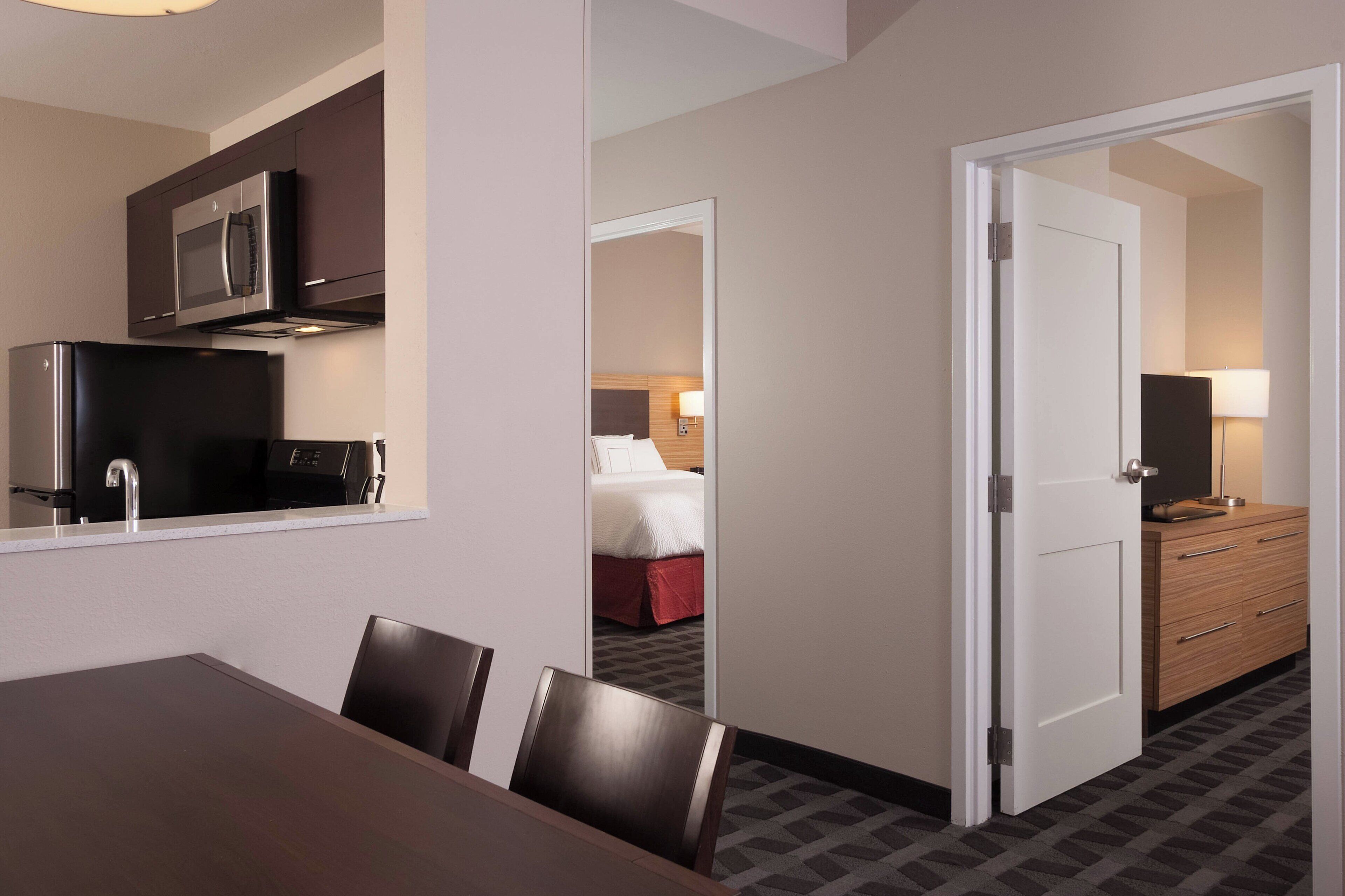 suite, 2 bedrooms | in-room safe, desk, laptop workspace, iron/ironing board