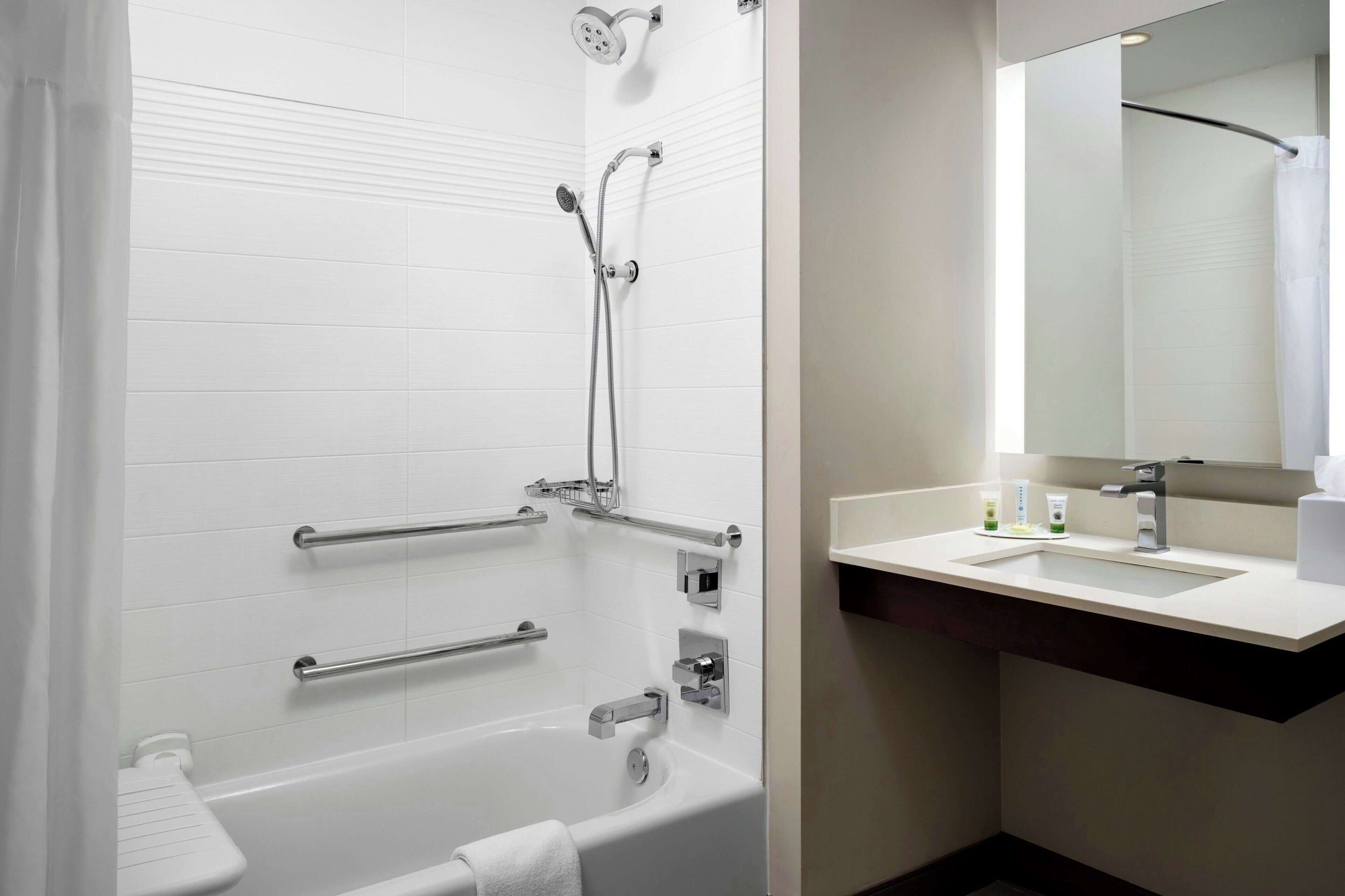 separate bathtub and shower, designer toiletries, hair dryer, towels