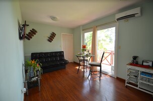 Family Apartment, 2 Bedrooms | Living room | 32-inch flat-screen TV with cable channels, TV