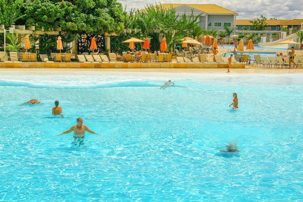 12 outdoor pools, pool umbrellas, pool loungers