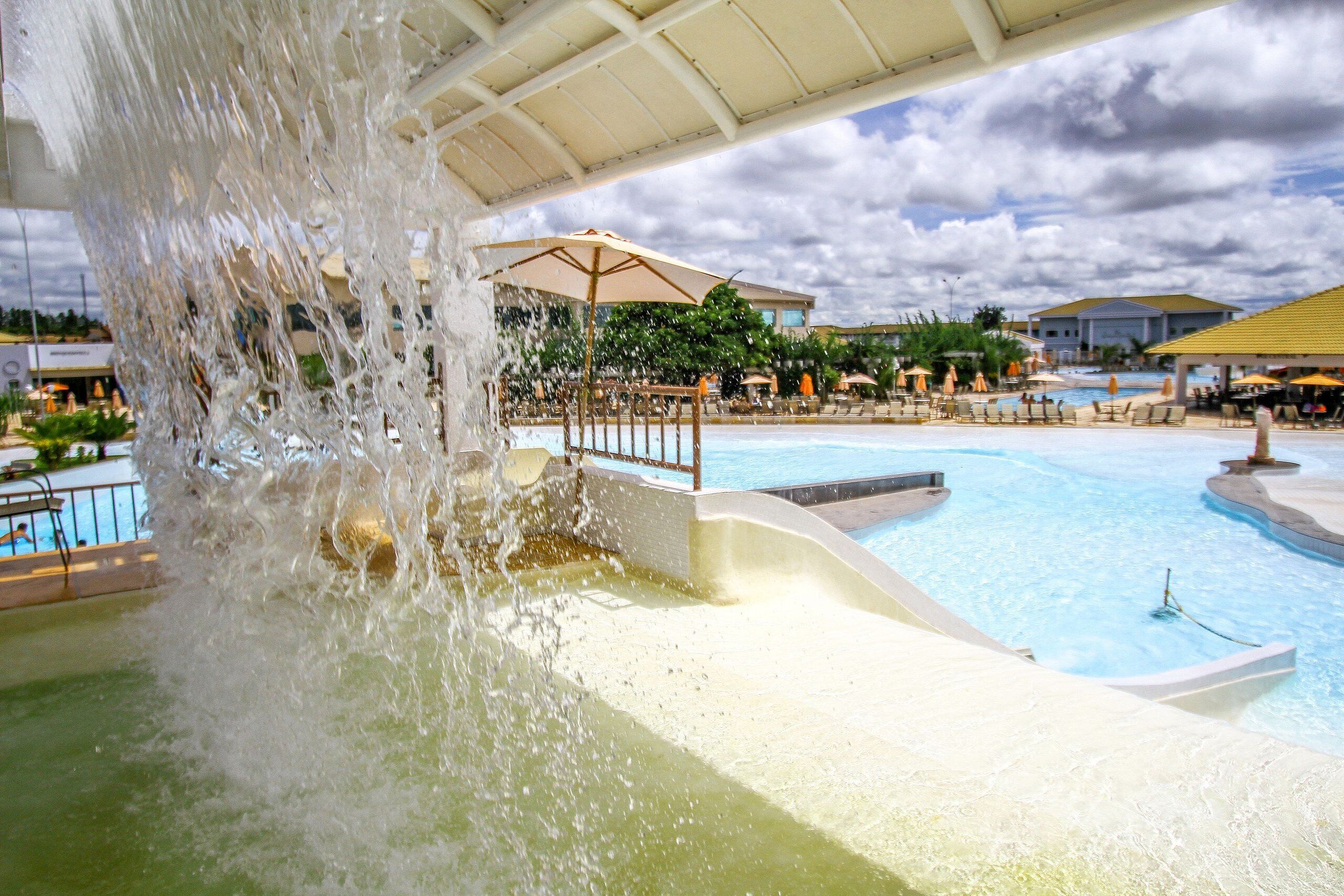 12 outdoor pools, pool umbrellas, pool loungers
