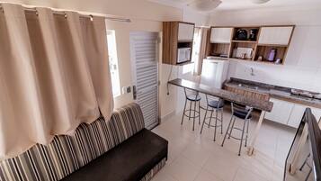Basic Apartment | Living area | 32-inch LED TV with cable channels, TV