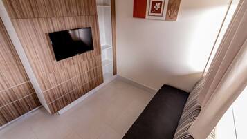 Basic Apartment | Living area | 32-inch LED TV with cable channels, TV