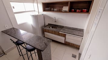 Apartamento | Cocina privada | Frigorífico y microondas