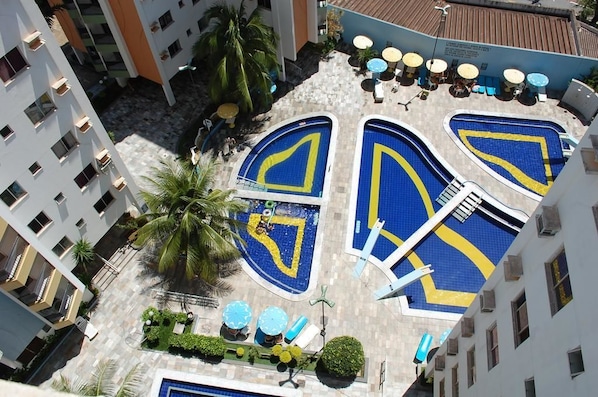 6 outdoor pools, pool umbrellas, pool loungers