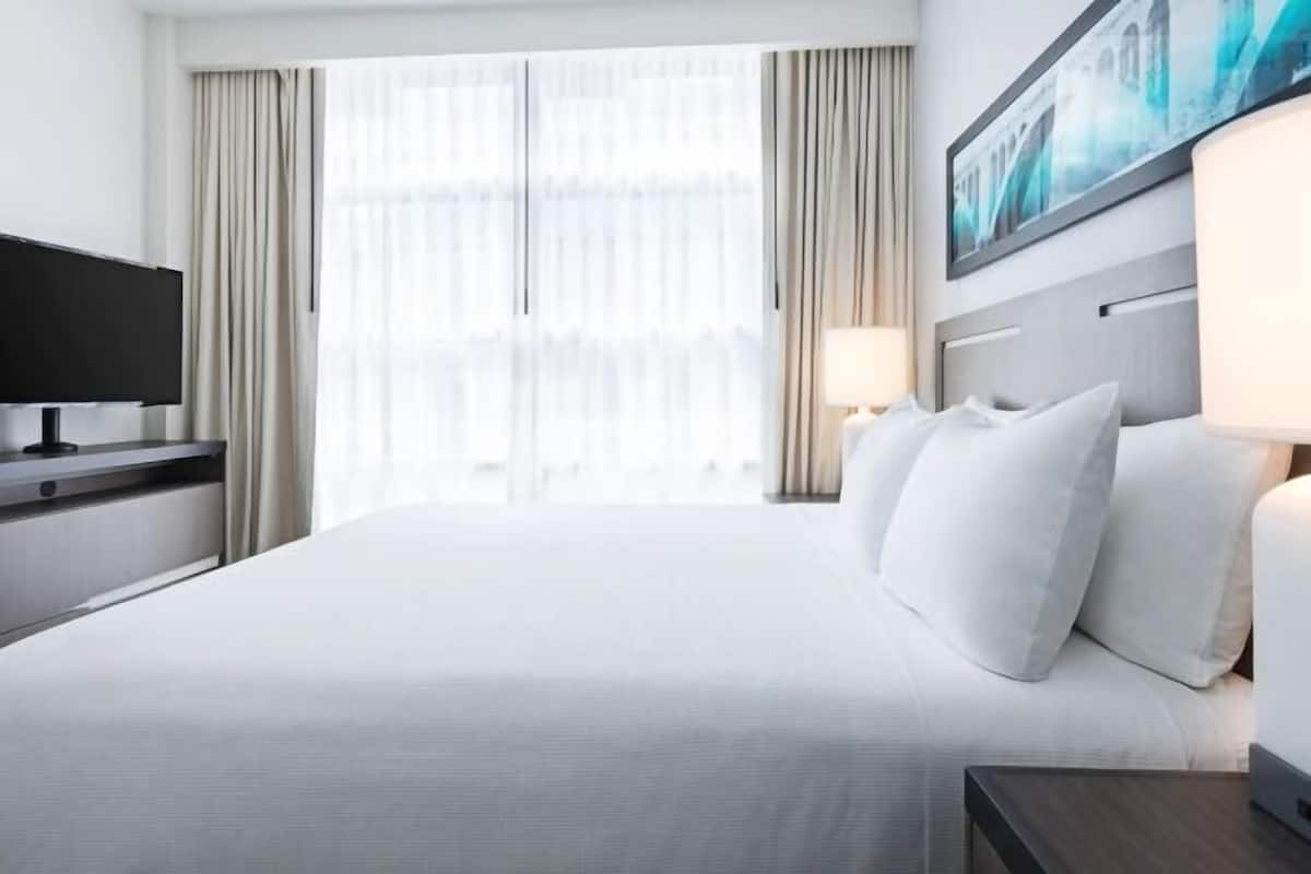 In-room safe, desk, laptop workspace, blackout drapes