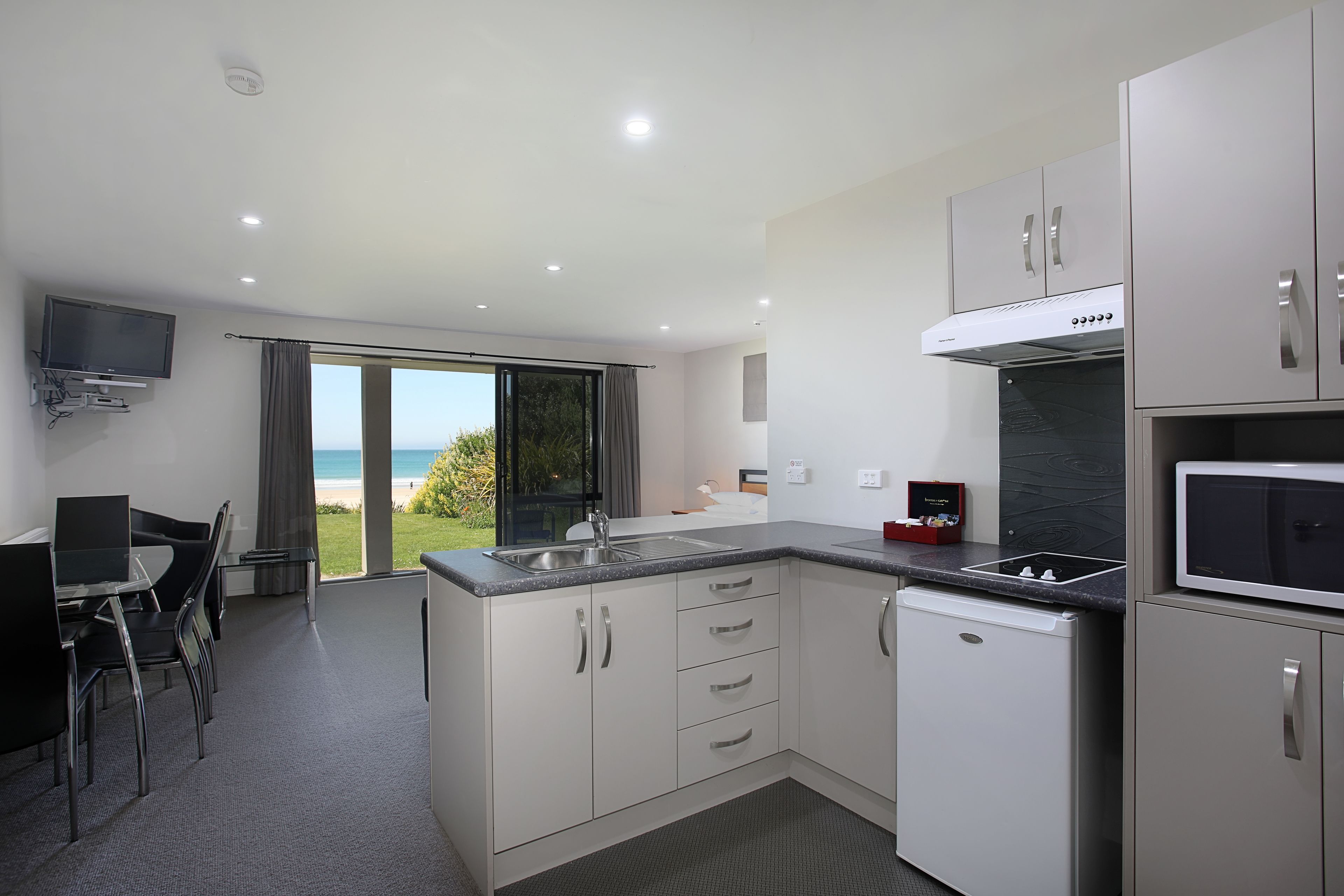 Microwave, electric kettle, cookware/dishes/utensils