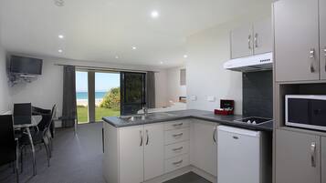 Microwave, electric kettle, cookware/dishes/utensils