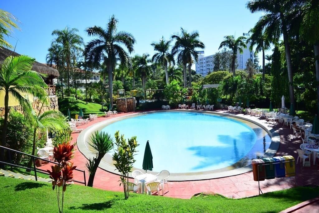 apartment, city view | pool | 6 outdoor pools, pool umbrellas, pool loungers
