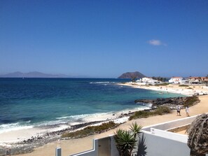 Na praia, toalhas de praia 