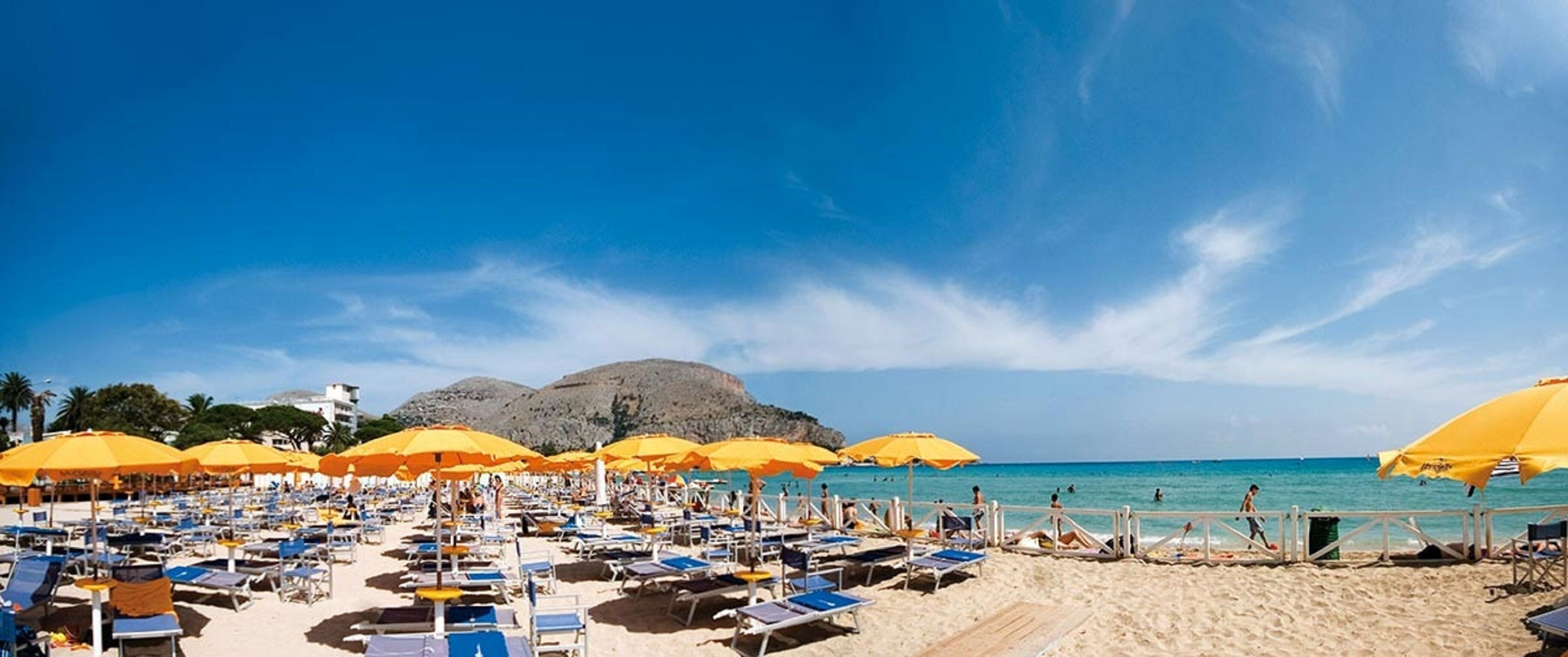 On the beach, beach towels