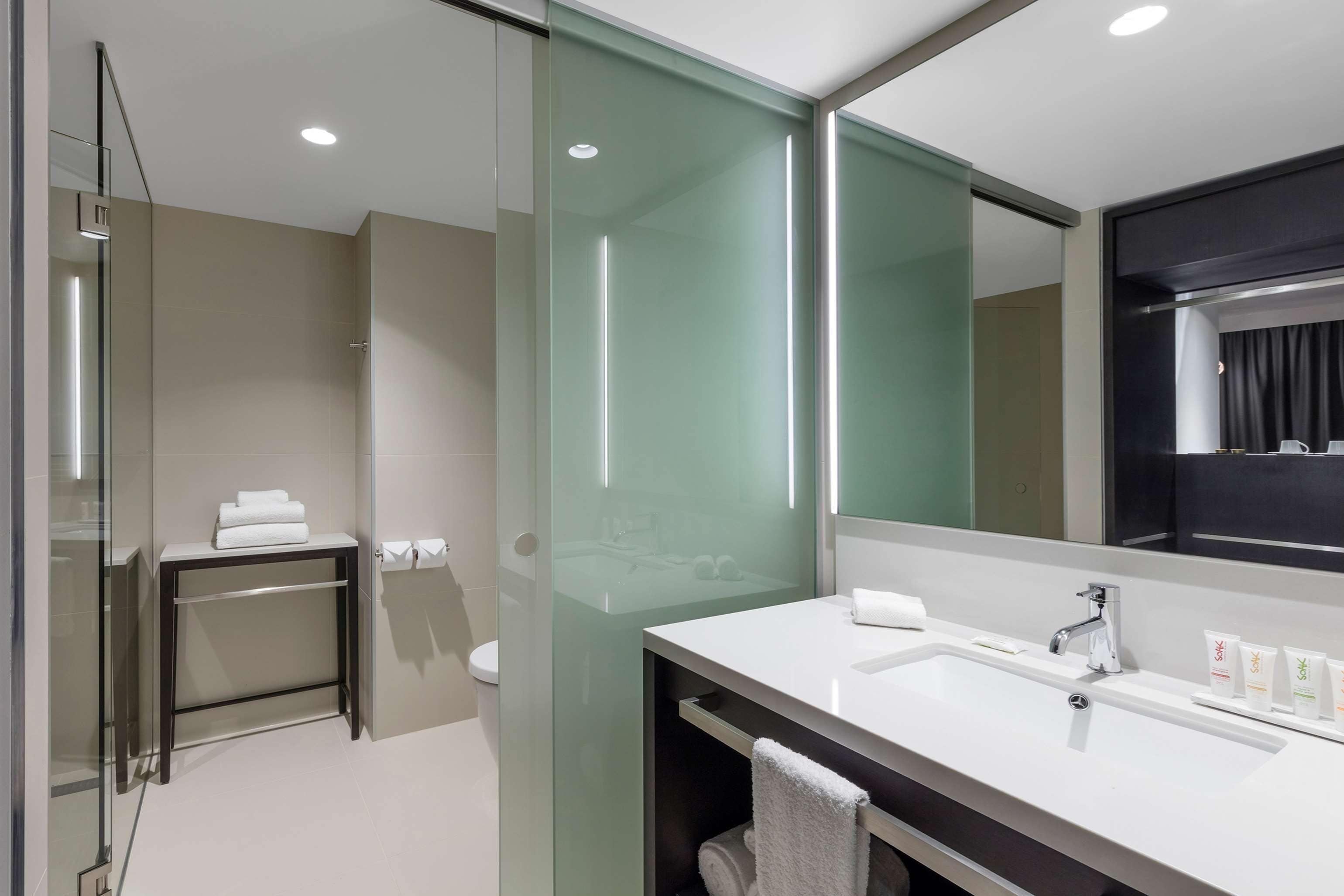 executive king room | bathroom | shower, free toiletries, hair dryer, bathrobes