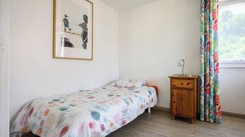 1 slaapkamer, een strijkplank/strijkijzer, wifi, beddengoed