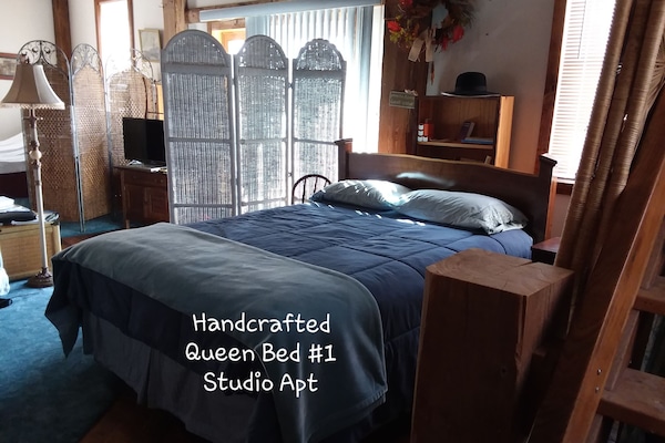 Enter deck via sliding glass doors. Two queen beds are to left & right of entry.