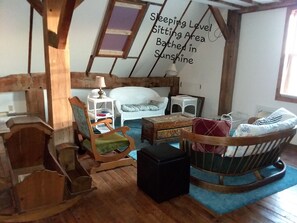 TV, books - River View. Rent Historic Mill's 2nd Floor. Rustic Timber-frame Construction (Shell Rock)