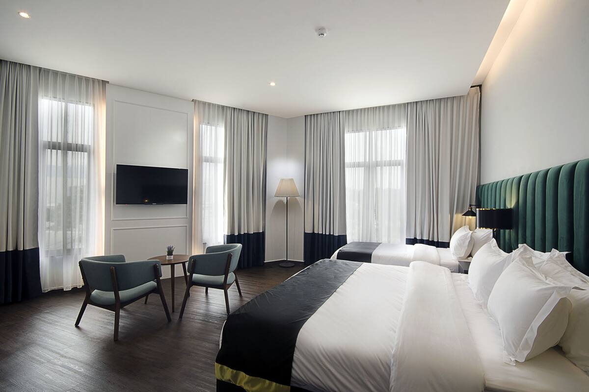 family room | 1 bedroom, desk, soundproofing, iron/ironing board