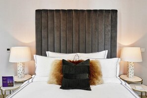 2 bedrooms, premium bedding, in-room safe, desk