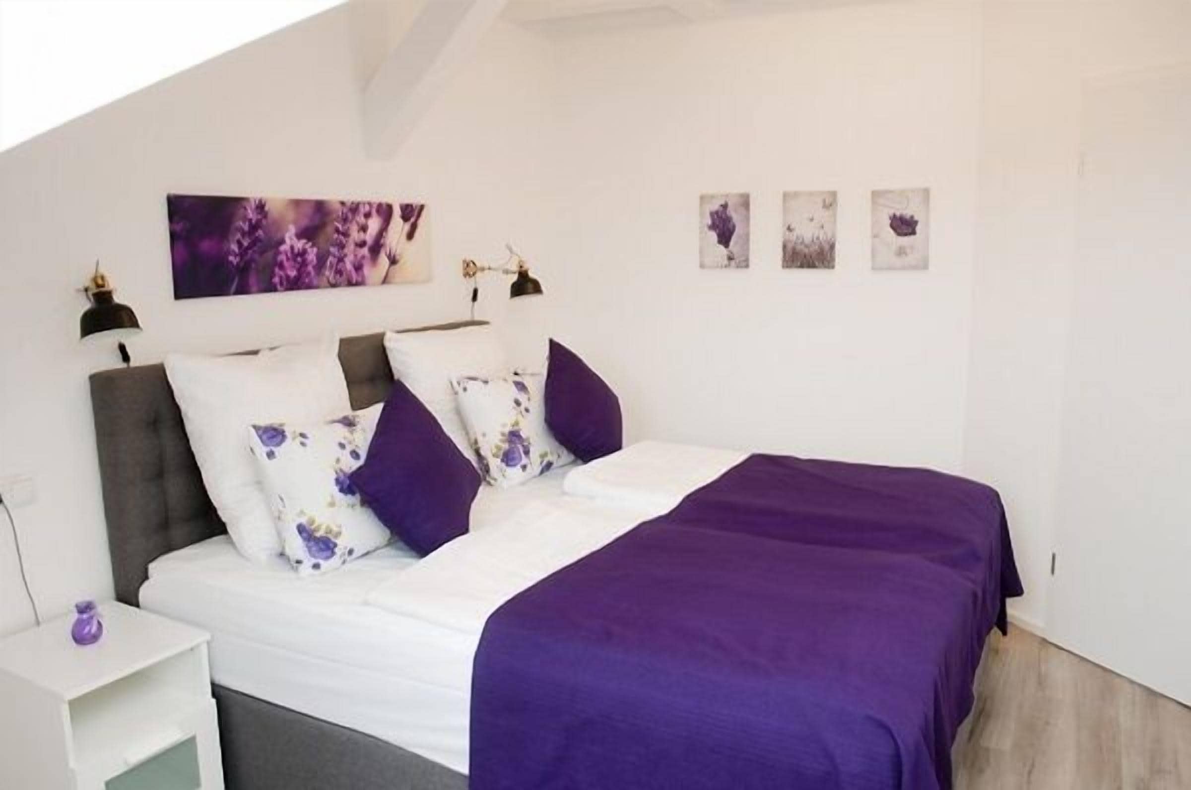 premium bedding, memory-foam beds, desk, blackout curtains