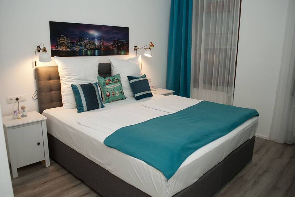 double room (city) | premium bedding, memory-foam beds, desk, blackout curtains