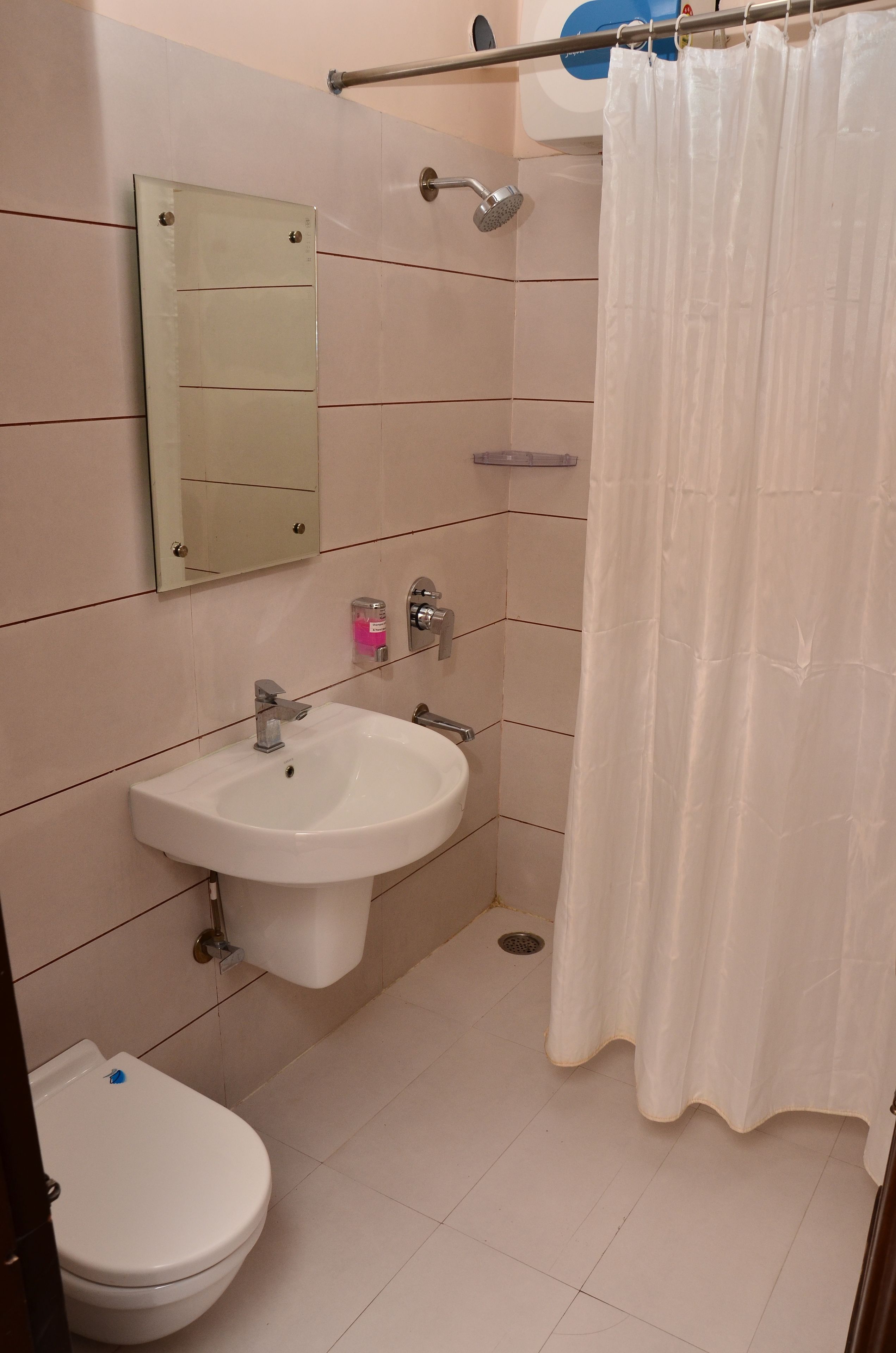 shower, free toiletries, slippers, towels