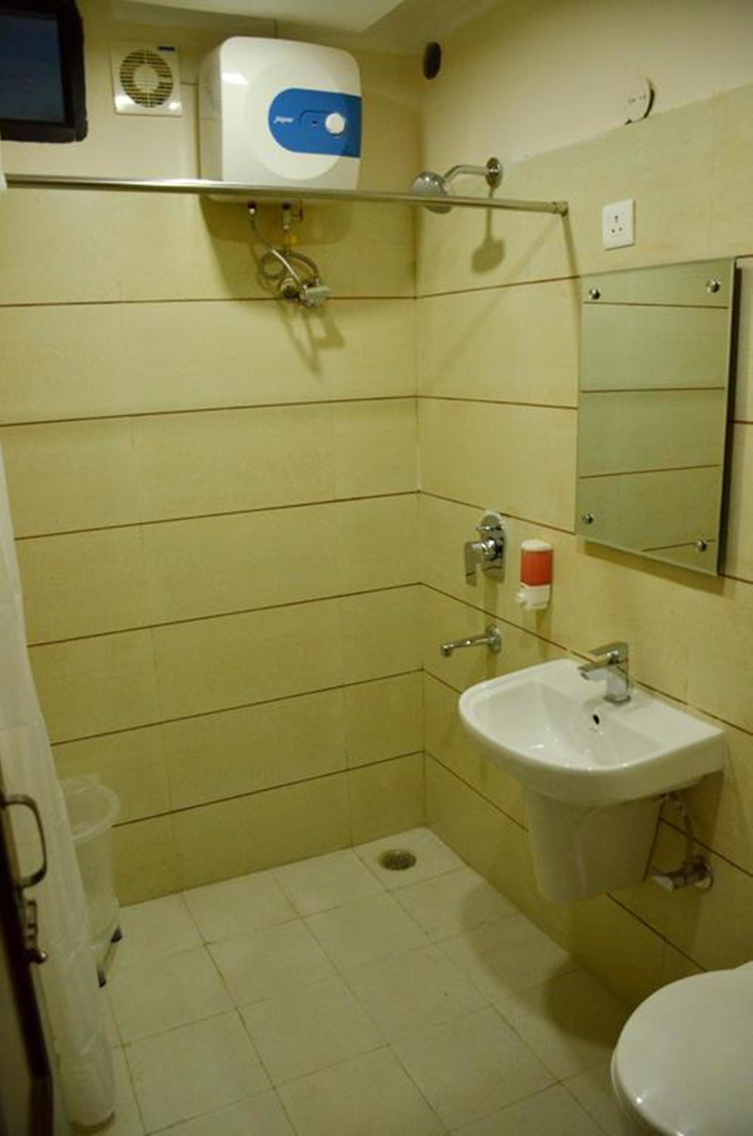 shower, free toiletries, slippers, towels