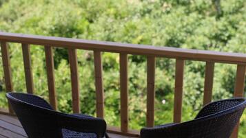 Deluxe Room, Sea View | Garden view