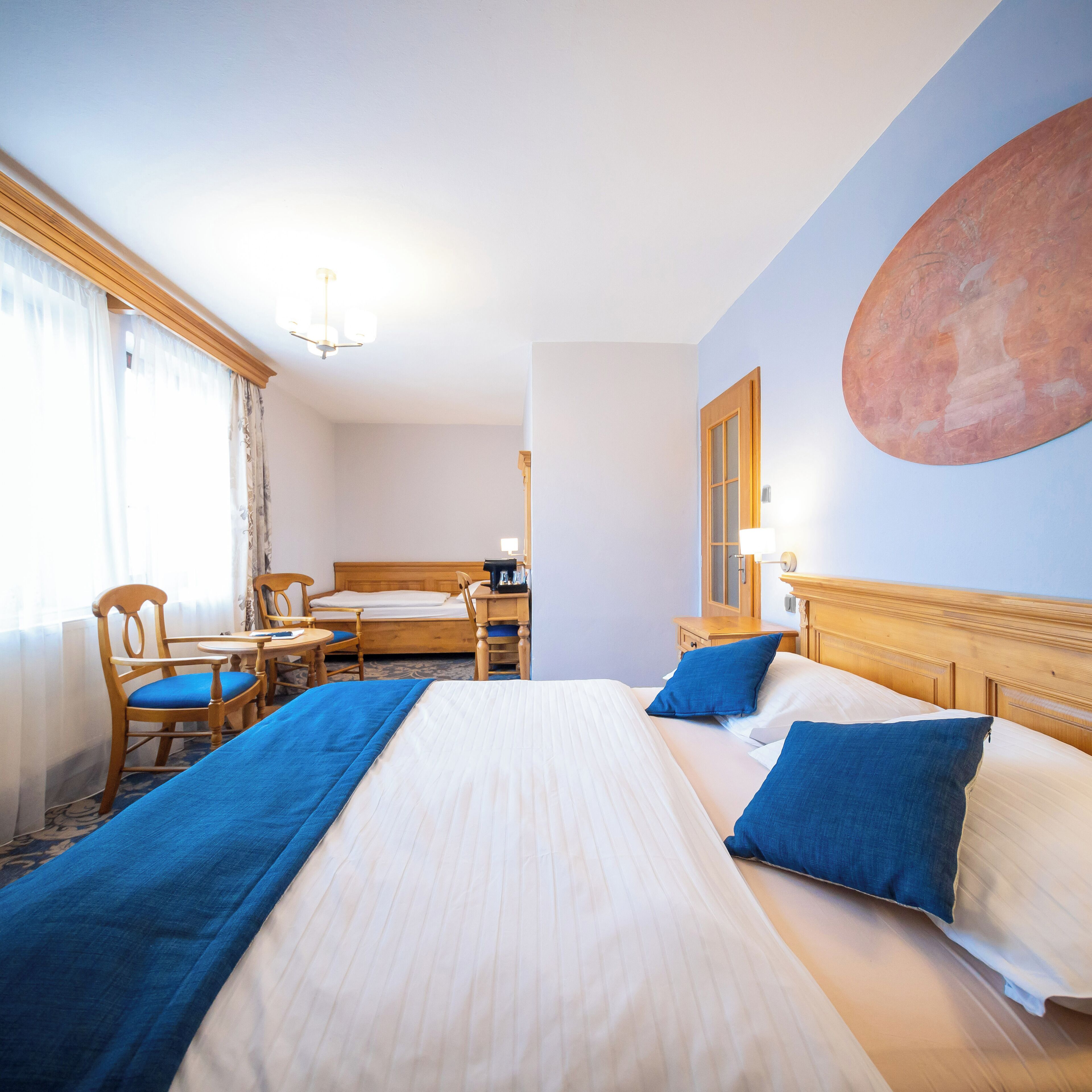 triple room | desk, laptop workspace, blackout curtains, iron/ironing board