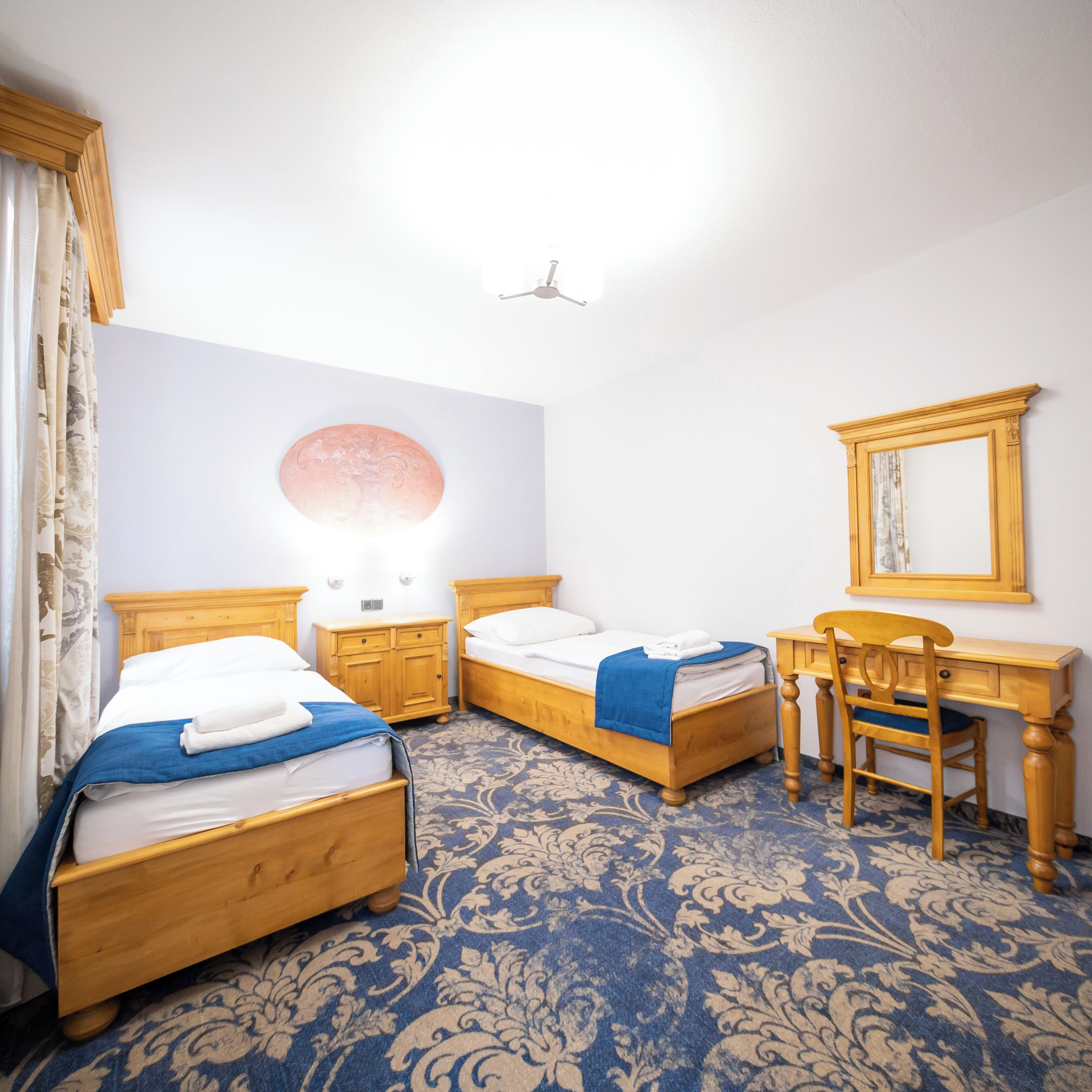 family room, 2 bedrooms | desk, laptop workspace, blackout curtains, iron/ironing board