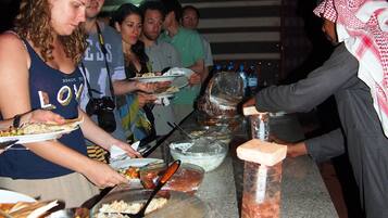 Breakfast, lunch, dinner served; local cuisine