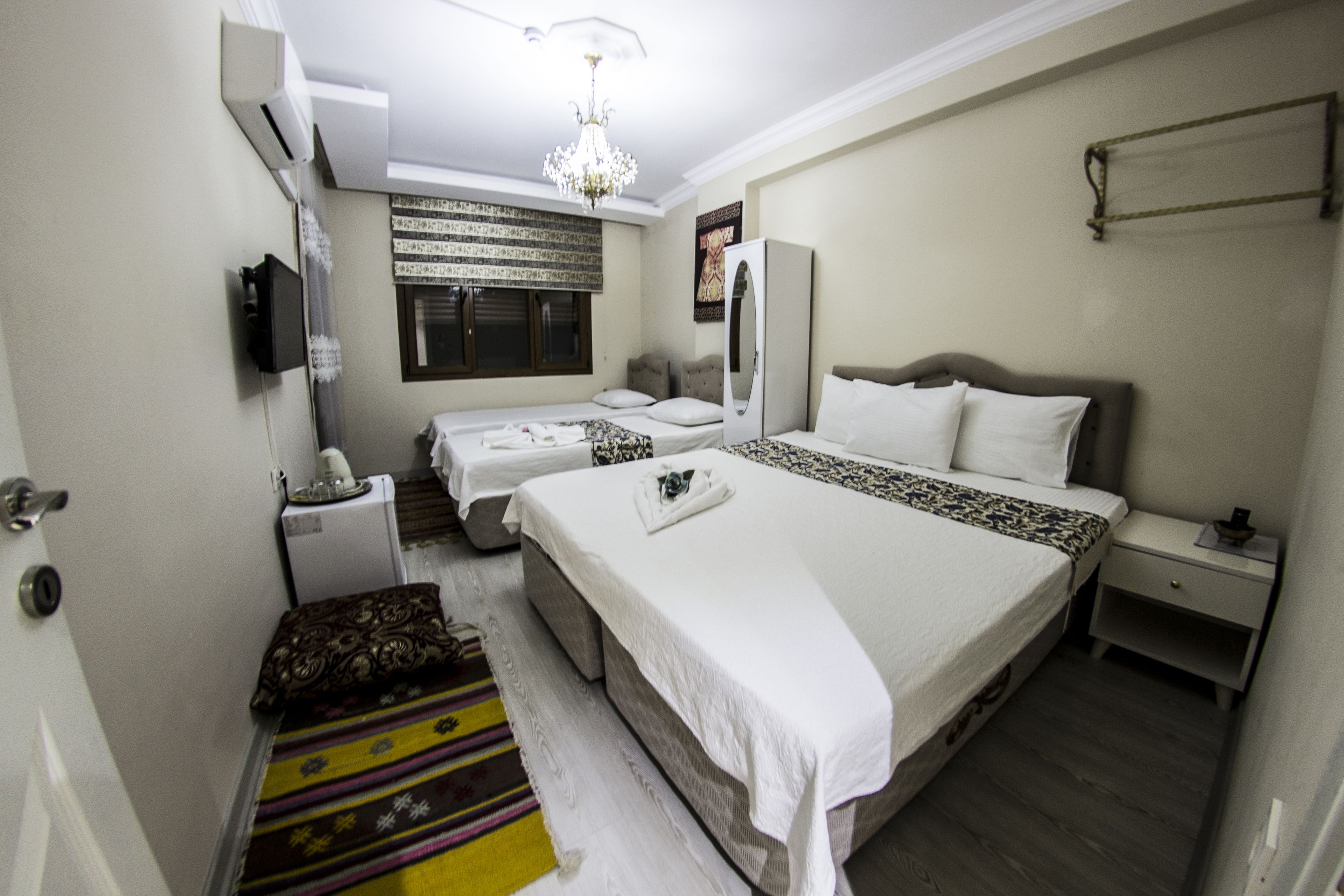 deluxe quadruple room, balcony, garden view | view from room