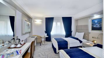 Suíte família | Frigobar, cofres nos quartos, escrivaninha