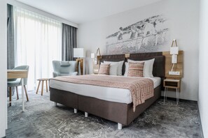 Junior-Doppel- oder -Zweibettzimmer | Allergikerbettwaren, Minibar, Zimmersafe, Schreibtisch