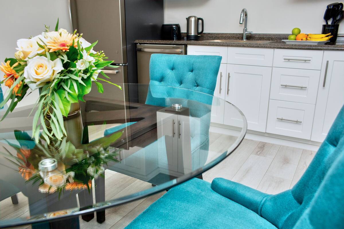 signature suite, 1 king bed, fireplace, garden area | in-room dining