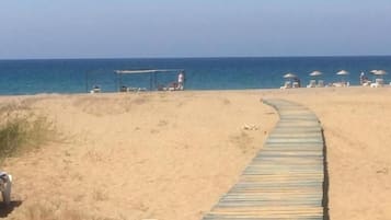 Private beach nearby, sun-loungers, beach umbrellas